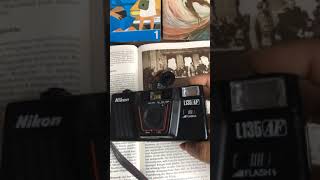 Nikon L135 AF point and shoot camera how to use and load a film