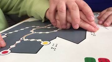 Blind person exploring a tactile map with the help of a sighted person - without Tactile Images app