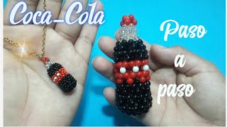 Botella COCA COLA hecha con perlas