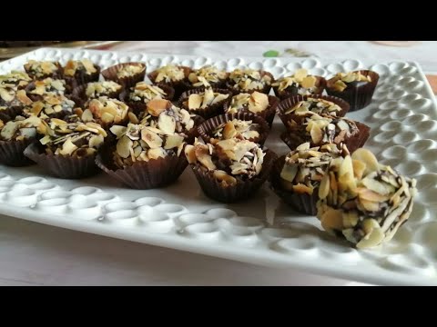 فيديو: حلوى الشوكولاتة باللوز والفواكه المسكرة