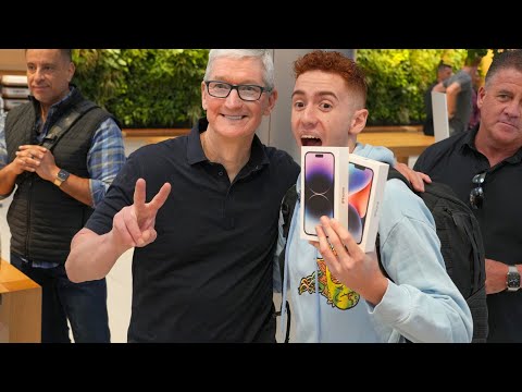Apple launches iphone 14 as customers line up to meet tim cook and get new tech