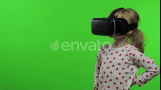 Child Girl Using VR Helmet To Play Simulation Game App. Watch Virtual Reality 3d Video. Chroma K... screenshot 5