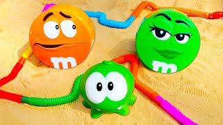 Ам Ням выращивает конфеты M&amp;M&#39;s! Мультики для малышей про игрушки Om Nom