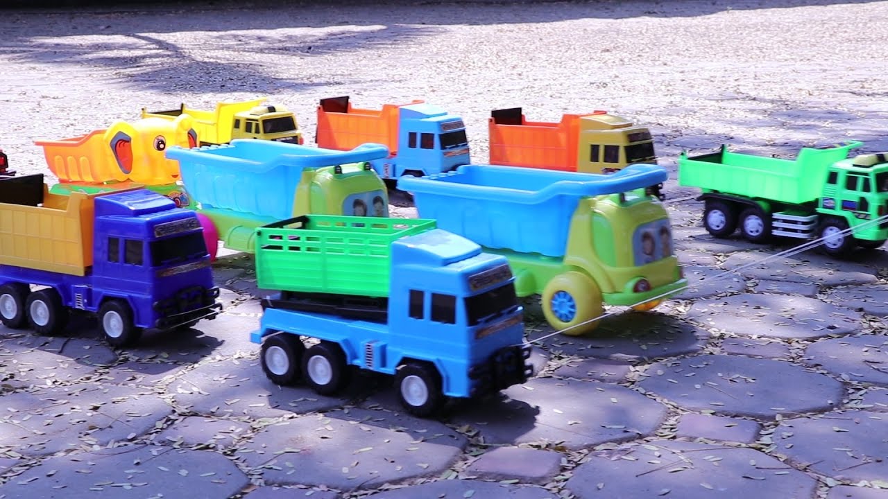 Trucks for children ขบวนฝูงรถบรรทุก รถดั้ม เล่นตักทราย รถแม็คโคร รถตัก