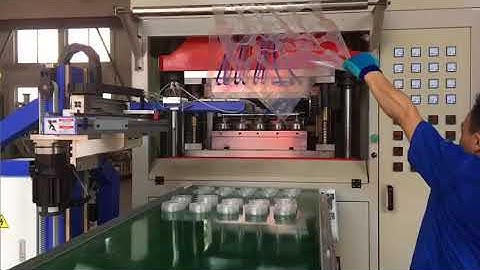 TQC-650B lid with robot stacker