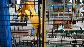 Desimone bottle unloading cell