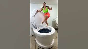 SUPER HIGH JUMP into Worlds Largest Toilet Black Pool in Slow Motion BIG SPLASH#shorts #swimvideo