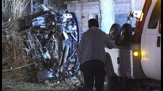 Range Rover heavily damaged after striking large boulder and rolling onto its side     driver still