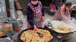 陕西夫妻卖河南小吃，5毛一个只包素没有肉，半个集市能卖 ... 