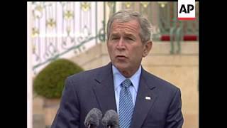 President Bush met with German chancellor Angela Merkel on Tuesday, pushing for solidarity against I
