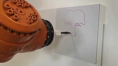 Robot Draws One Line Portrait on Canvas - 1140173