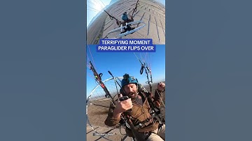 Terrifying moment paraglider falls out of the sky