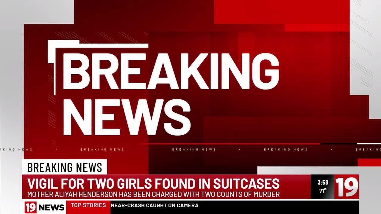 Vigil for two sisters found in suitcases