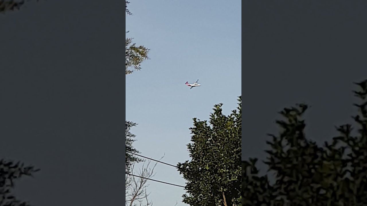 QANTASLINK DASH 8 200 TAKES OFF FROM SYDNEY