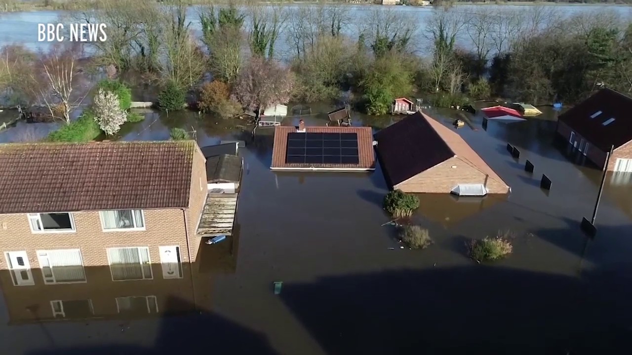 UK weather : Family's house almost completely underwater in shocking ...