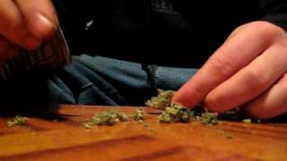 Timelapse rolling a joint