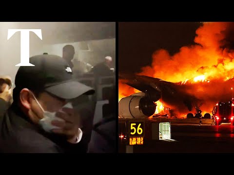 Moment Japan Airlines plane explodes on landing in Tokyo