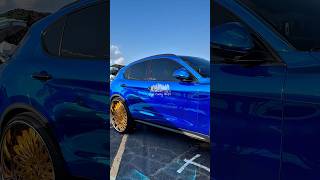 Blue chrome wrapped Alfa Romeo on 30s #eyecandywhipz #carshow #bigrims #alfaromeo #wrappedcars