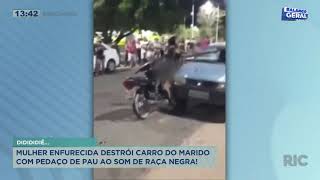 Mulher enfurecida destrói carro do marido com pedaço de pau ao som de “Raça Negra”