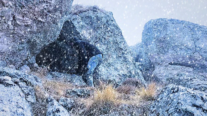 Caught in snow and blizzard/Building a safe shelter in the mountains/Surviving a cold winter night.