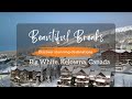 Discover the winter wonderland of big white ski resort 4k drone view