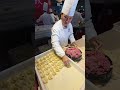 Filling Chinese Dumplings. Italy Food Festival