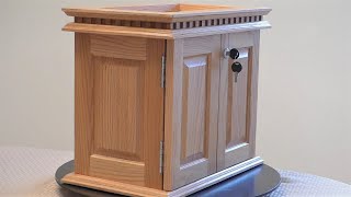 : Small cabinet with dentil molding