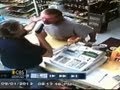 Watch: Liquor store cashier pulls gun on would-be robber