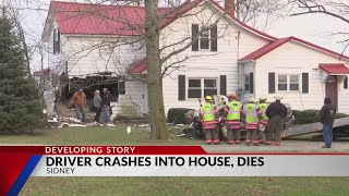 Driver dies after crashing into house in Sidney