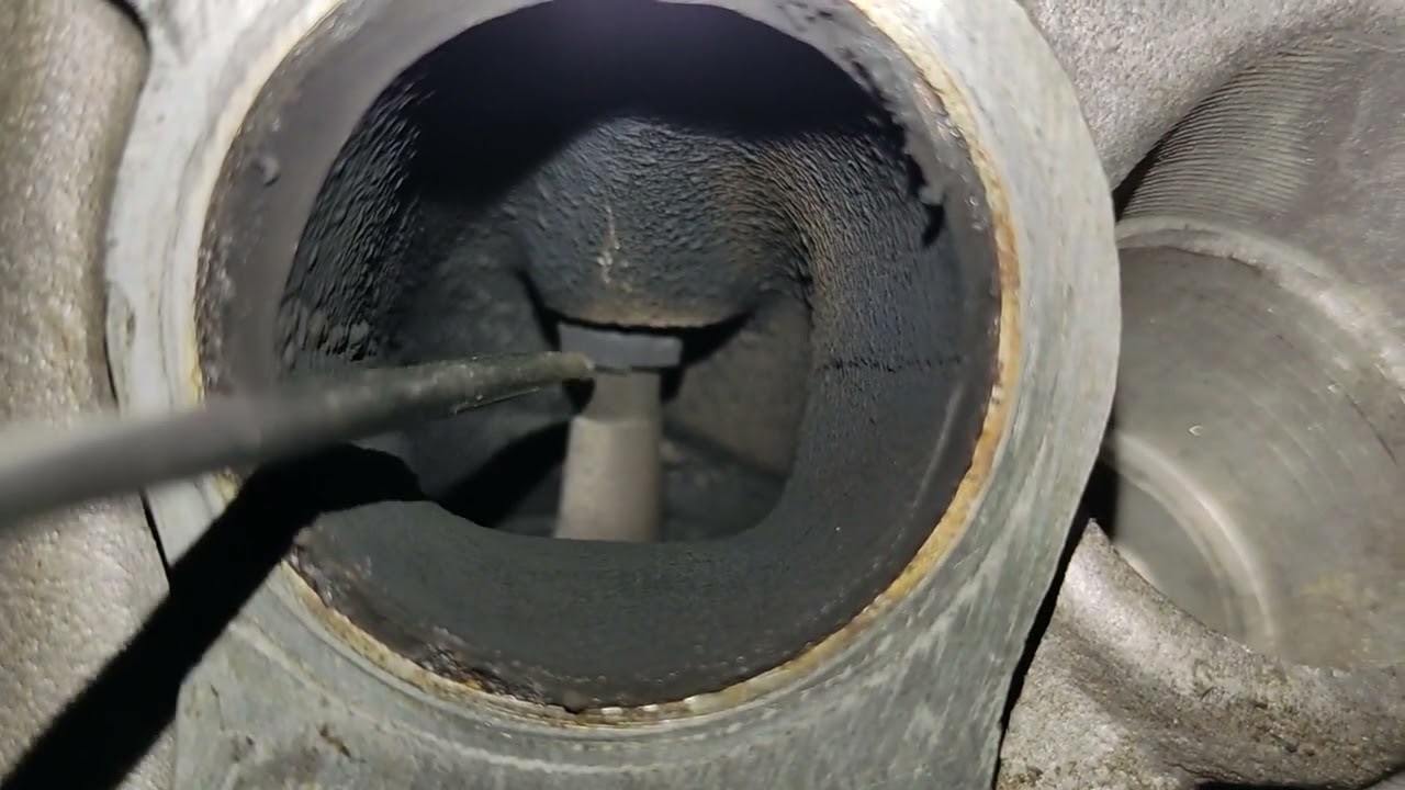 como identificar se a fumaça azul é pelos anéis de pistão ou vedador de cabeçote , fácil de entender