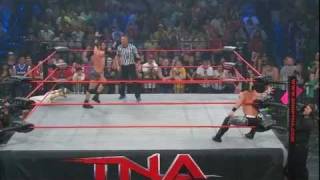 Austin Aries - Running bulldog followed by Horns of Aries (bridging arm trap triangle choke)