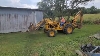 John Deere JD300 Front Loader and Back Hoe