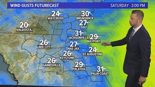 Breezy with a few isolated sprinkles Saturday with a big warm up next week