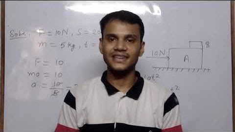 A small block B is placed on another block A of mass 5kg and length 20cm. Initially the block B is.