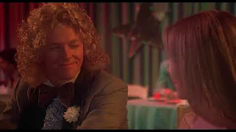 Carrie talking to Miss Collinsat prom (1976)