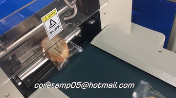 Flow pack machine for bread packaging with gas nitrogen inflation system