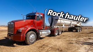 Kenworth HAULING “HUGE” Rocks with half round end dump trailer