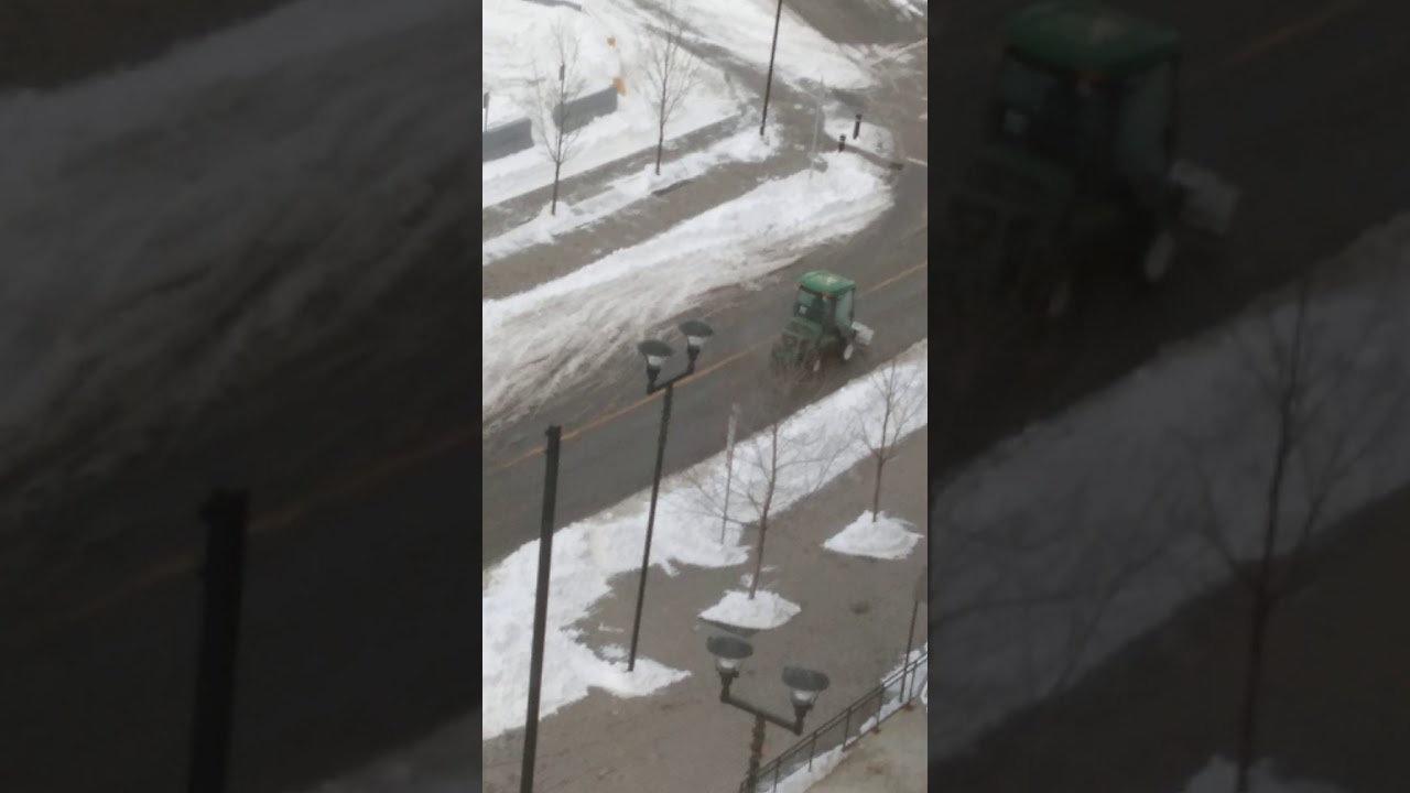 yyc Snow clearing in East Village, Calgary, Alberta.