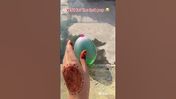 Will a big balloon explode if it rolls down from height?  #asmr #balloon #colors #shorts