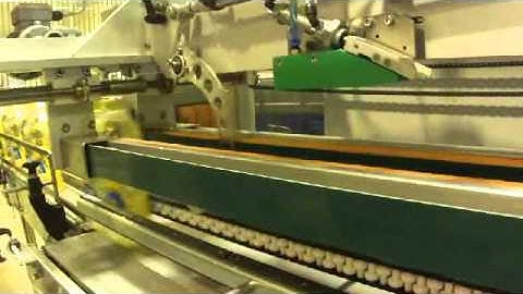 IC Filling Systems - MULTIPACK HANDLE APPLICATOR - 40 PACKS PER MINUTE