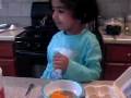 3 year old chef cooking egg omlette