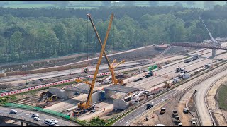 M25/A3 Wisley Junction 10 - New roundabout bridge beam installation by drone in time-lapse x5 speed.