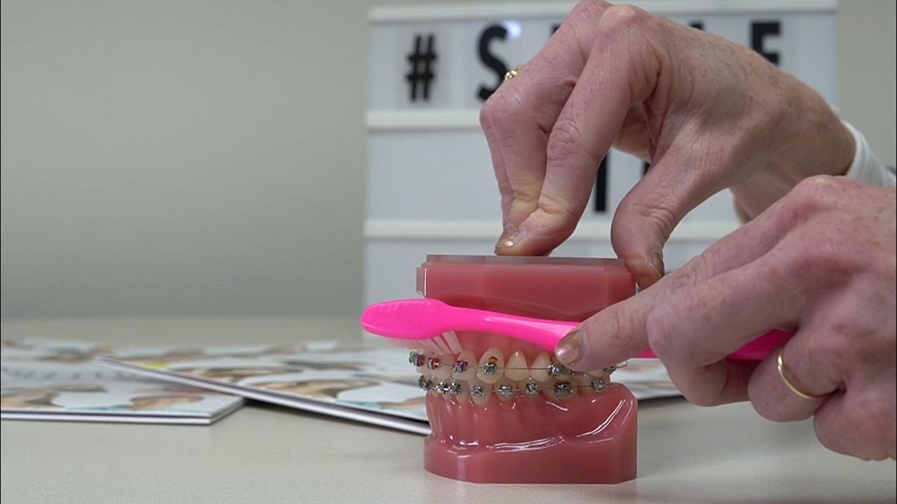 How to brush with braces YouTube