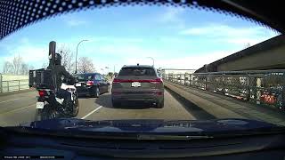 Illegal lane splitting motorcycle 0527B7