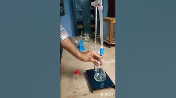 Reaction... Between NaOH and HCl using Phenolpthalein as an indicator..