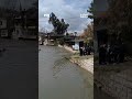 الربيع يكسو الجبال المحيطة بالربوة في دمشق مع جريان نهر بردى بعد الهطولات المطرية الأخيرة