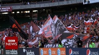 Why do these US football fans chant in Spanish? - BBC News