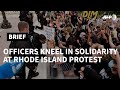Black rights protests in Rhode Island as officers take a knee | AFP