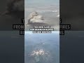 Thick smoke clouds from Washington wildfires rise above the mountains