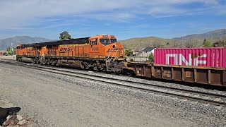 Short BNSF double stack glides by Tehachapi California depot. March 24, 2026